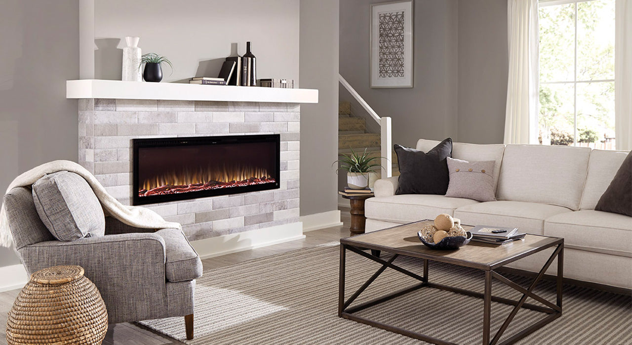 Fireplace with mantel and stone surround in living room